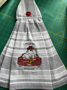 Over the door hanging towel.  "I'm not old, I'm Classic"