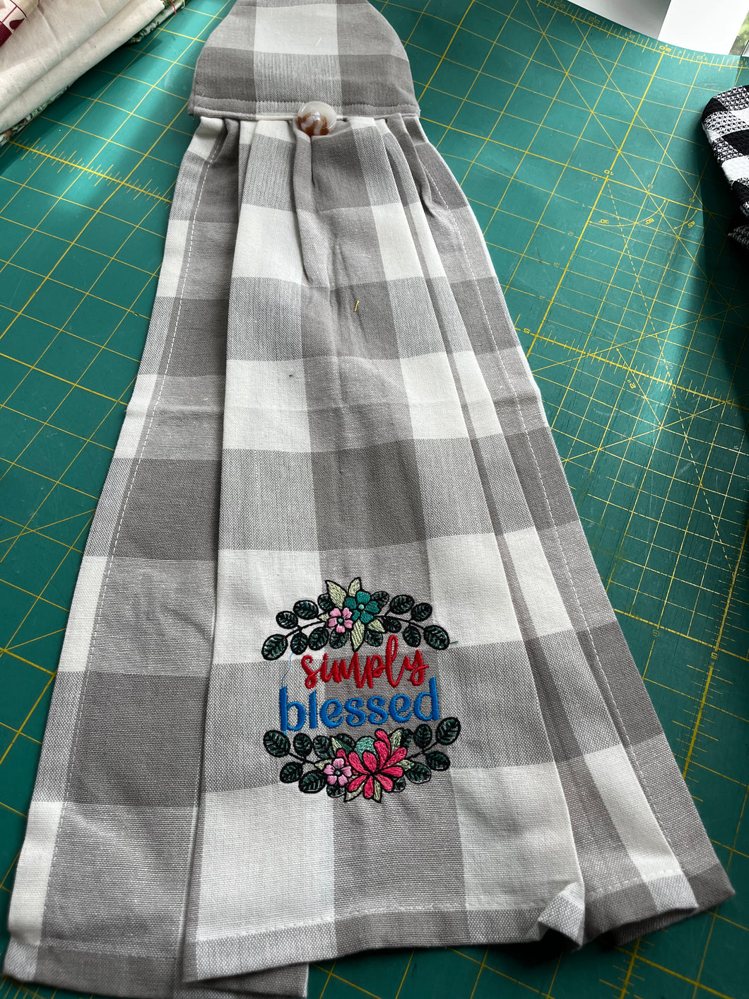 Over the door hanging towel.  Simply Blest