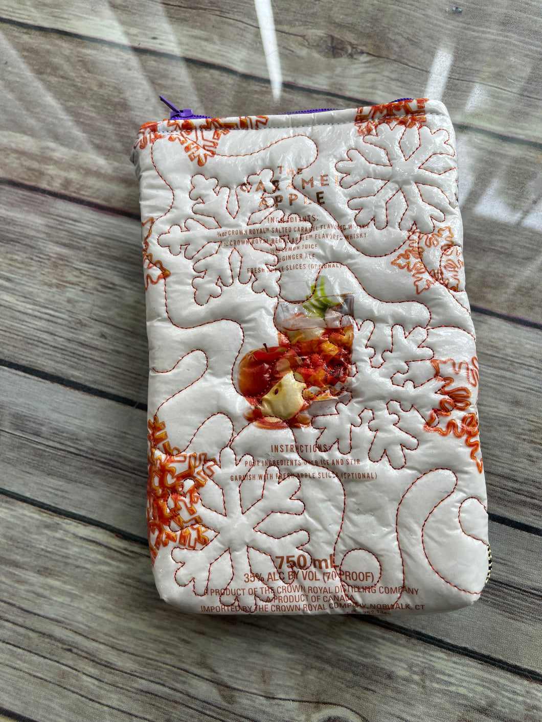 Crown Royal Carmel Apple embroidered clutch bag