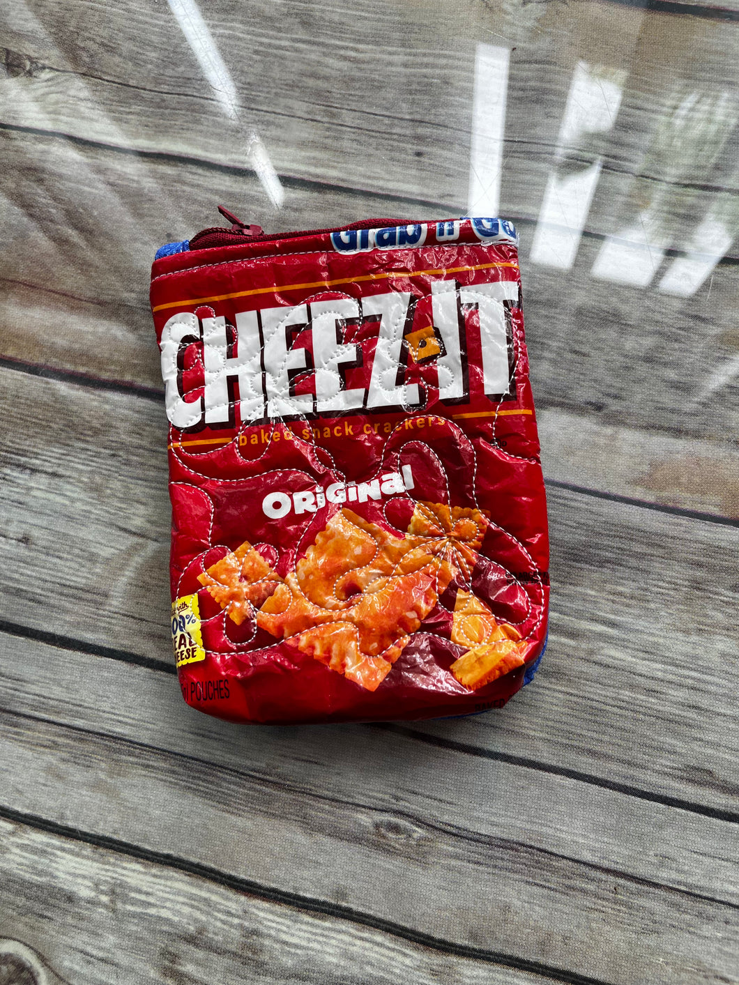 Cheez-its embroidered clutch bag