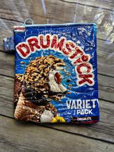 Drumstick embroidered clutch bag