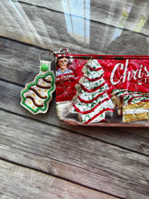 Load image into Gallery viewer, Vanilla Christmas tree Cakes Little Debbie clutch bag
