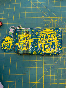 Hazy Little Things IPA zippered clutch bag with attached key tag
